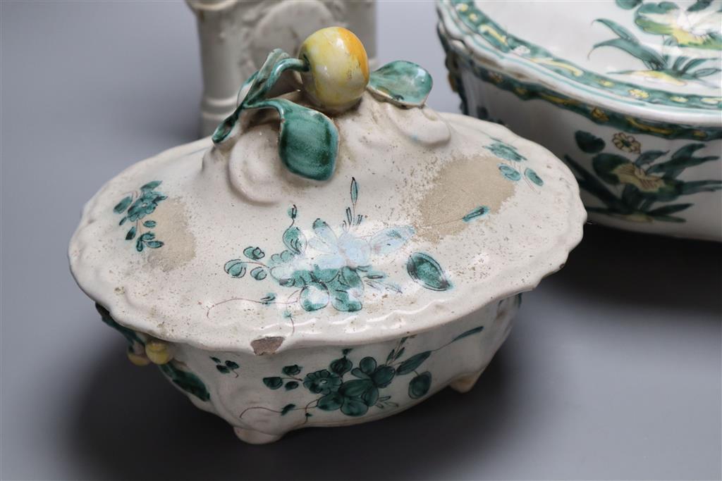 Two 19th century French faience tureens and covers and a Staffordshire pottery group, height 28cm